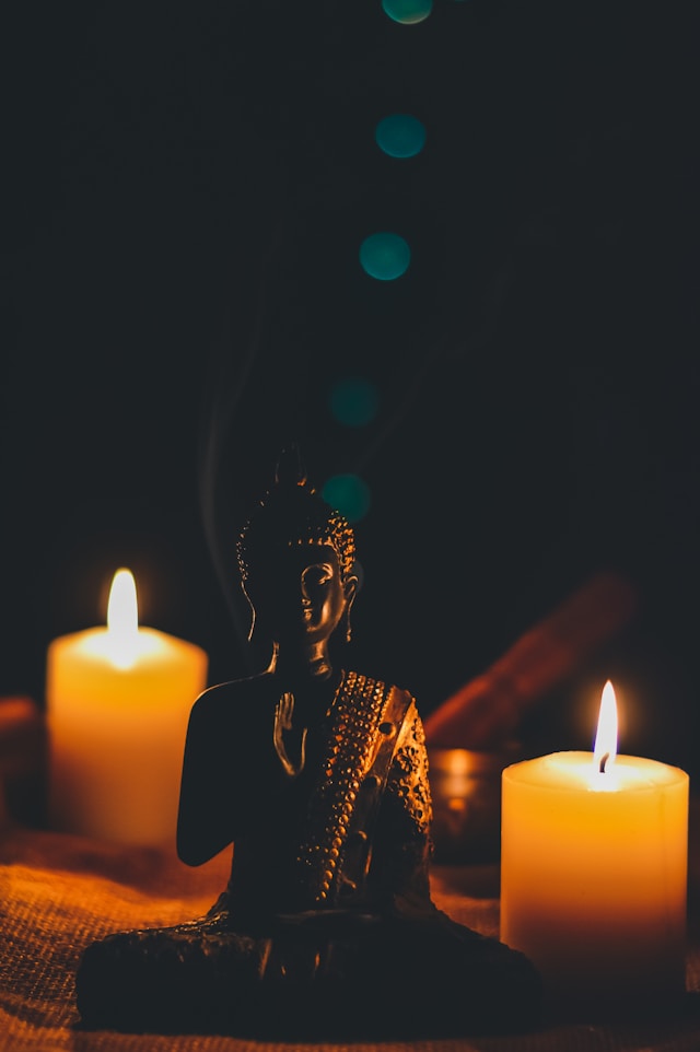 buddha and candles peace in a reiki session